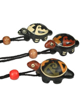 Whistles on Cord blk/wht Singing Turtle Clay Whistle on Cord